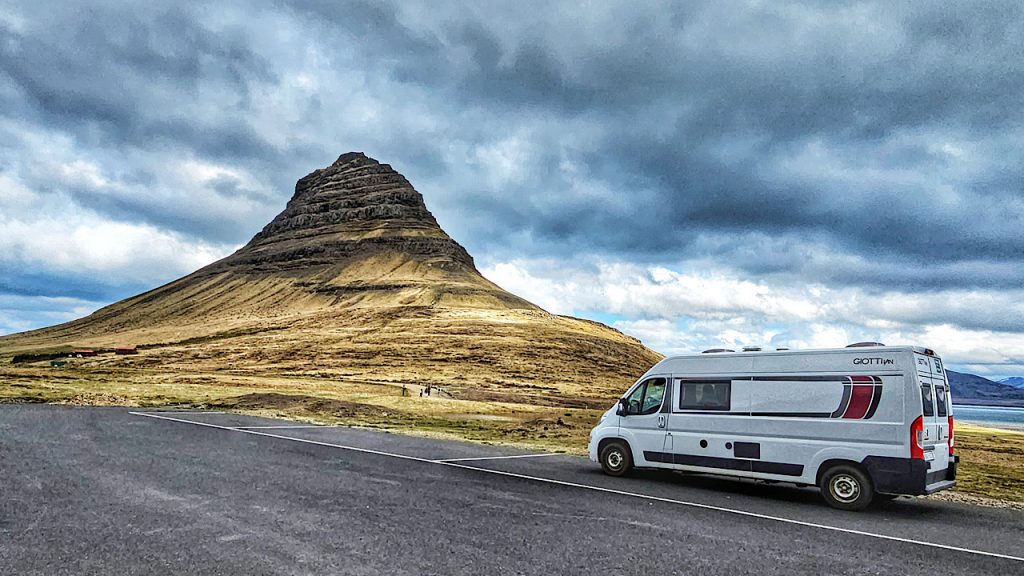 A camper van at Kirkjufell mountain on the Snæfellsnes Peninsula
